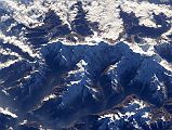 Manaslu 00 03 Nasa ISS008-E-6343 Close Up Nasa has some excellent images of Manaslu. Here is a view from the south east, with Manaslu (8163m) on the far right with the large sunlit plateau. To the left is the pointy peak, Ngadi Chuli (7871m, Peak 29), and then further to the left Himal Chuli (7893m).